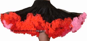 multi coloured petticoat, trimmed with fluff or ruffles.